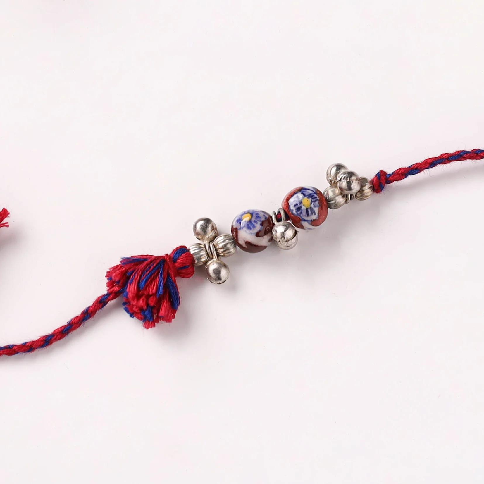 Handcrafted Patwa Threadwork Blue Pottery Beads Rakhi 06 - Image 2