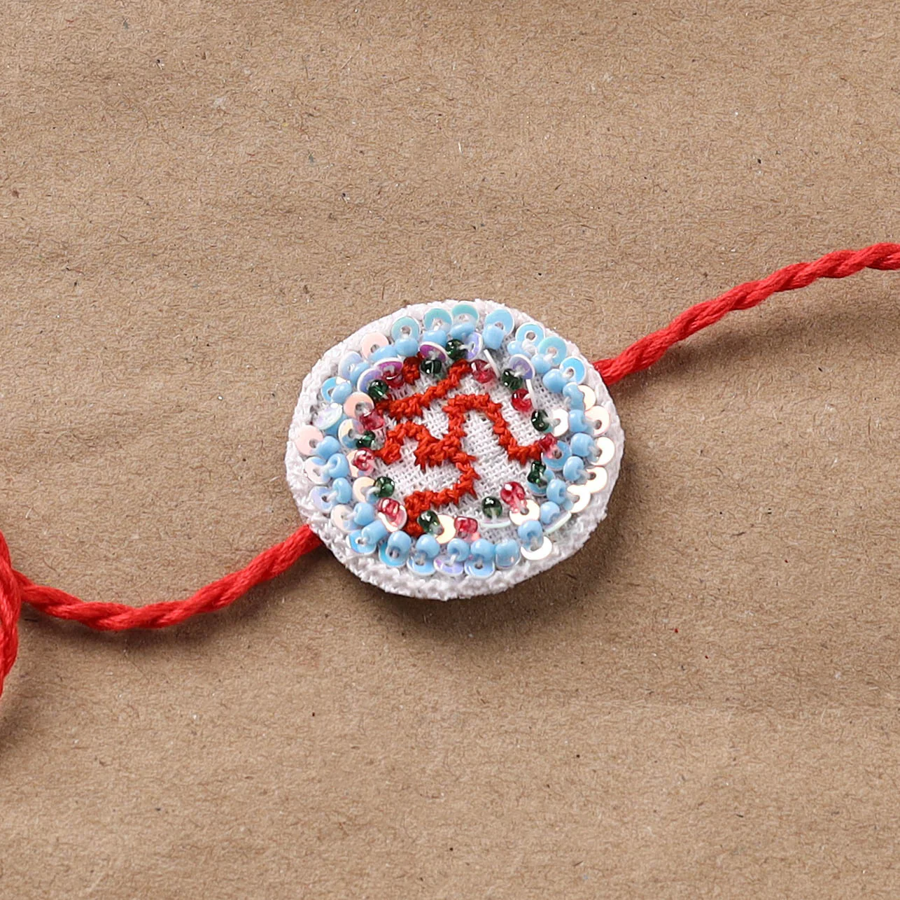 Om - Hand Embroidered Thread Work Rakhi 03 - Image 2
