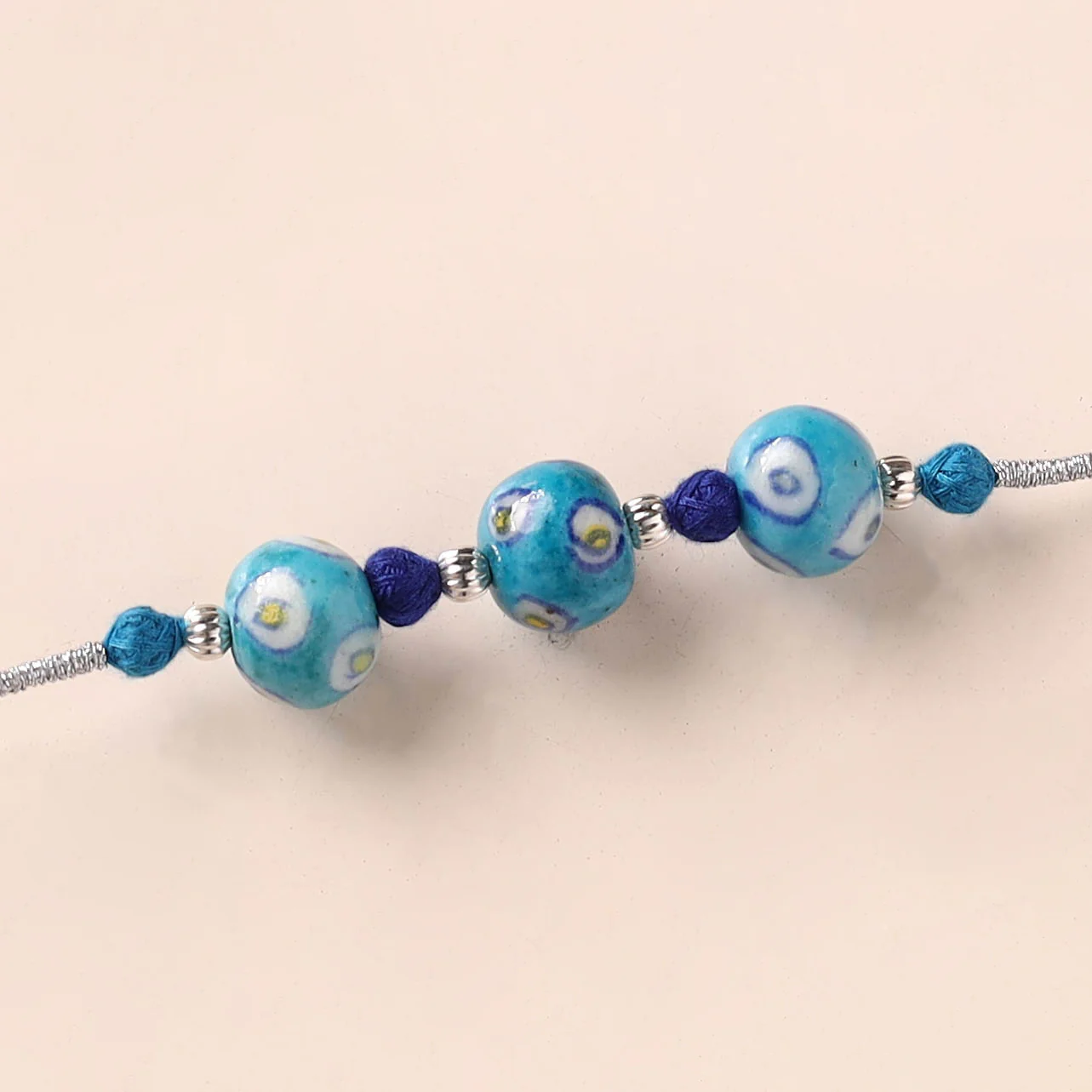 Handcrafted Patwa Threadwork Blue Pottery Beads Rakhi 11 - Image 2