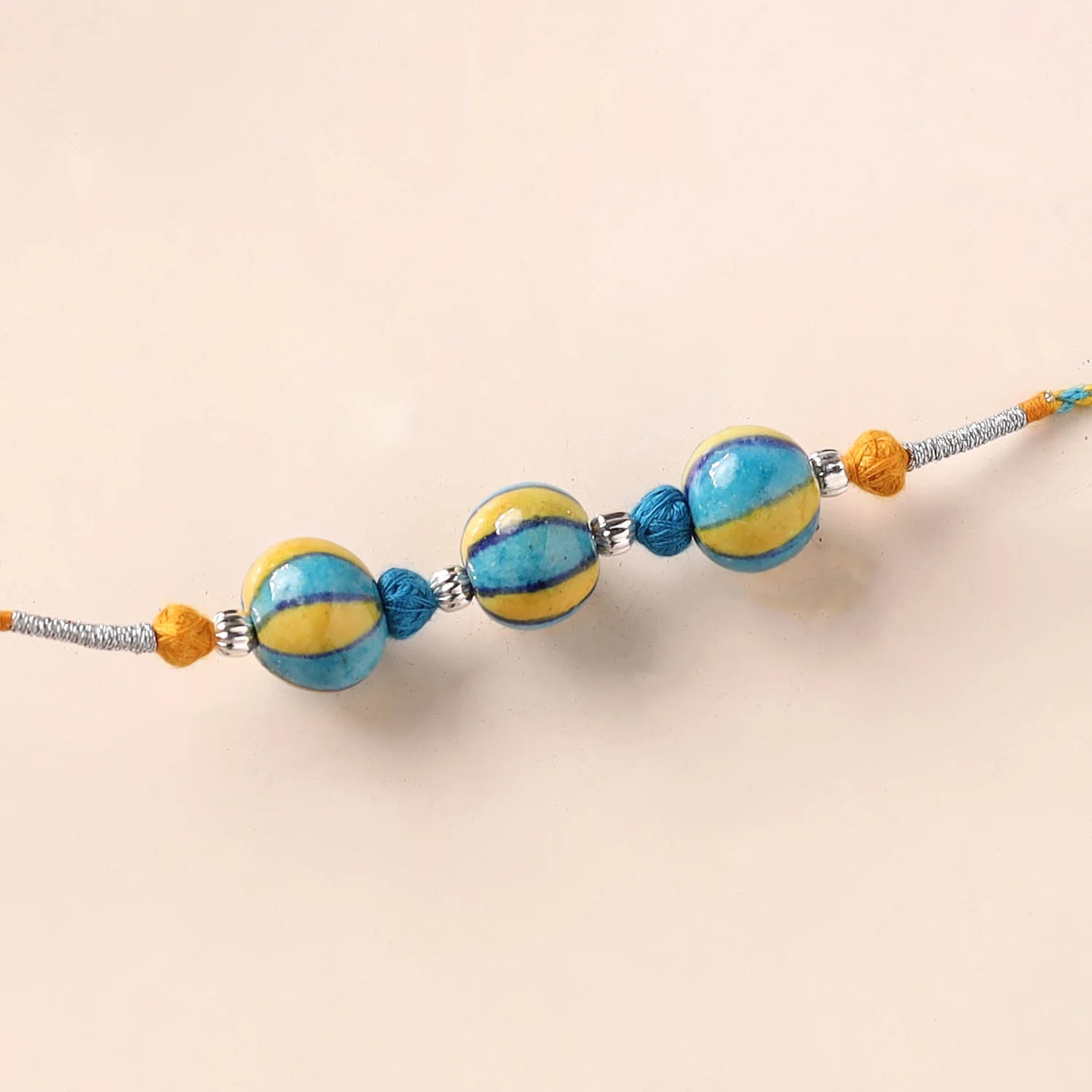 Handcrafted Patwa Threadwork Blue Pottery Beads Rakhi 13 - Image 2