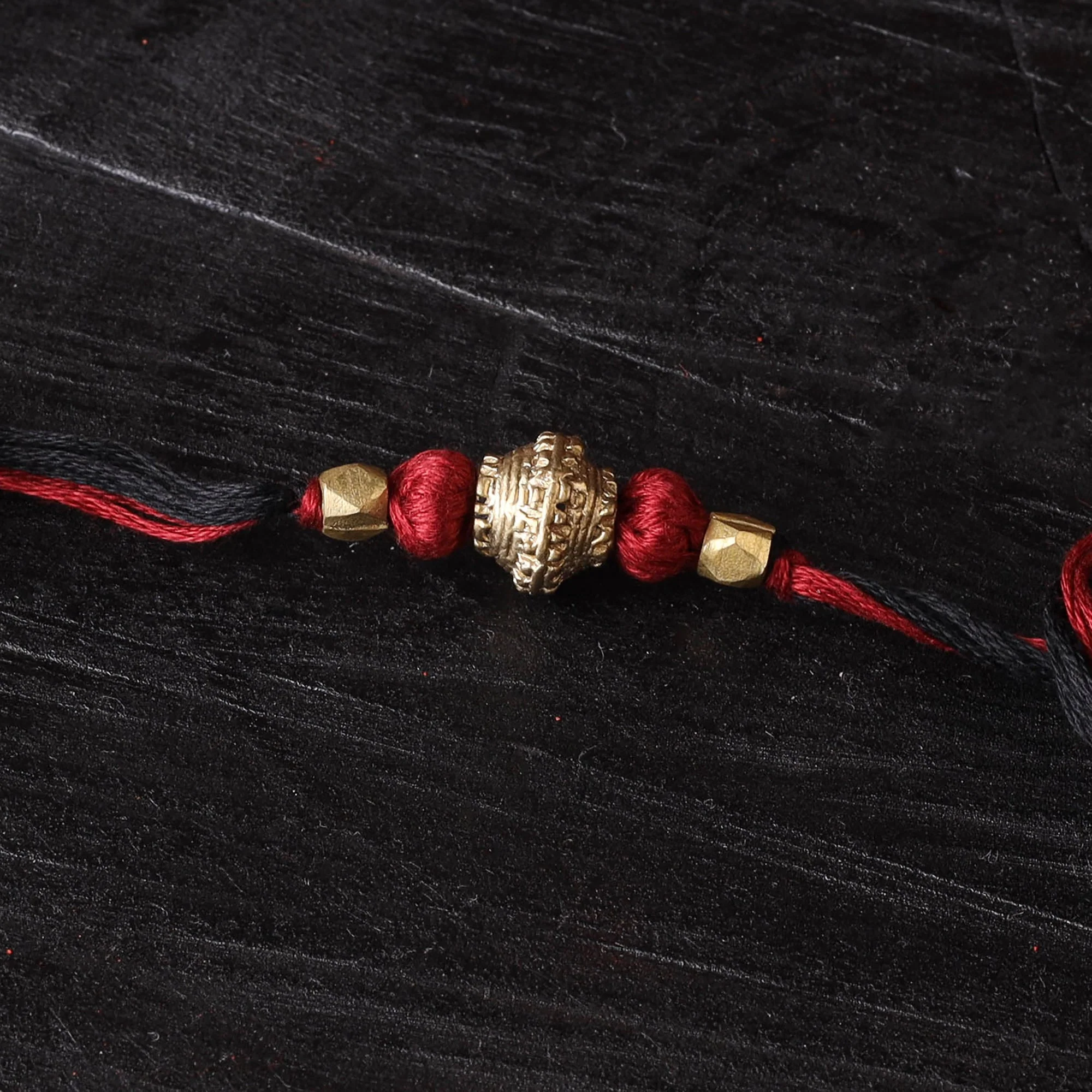 Multicolor - Handcrafted Tribal Dokra Brass Thread Rakhi 19 - Image 2