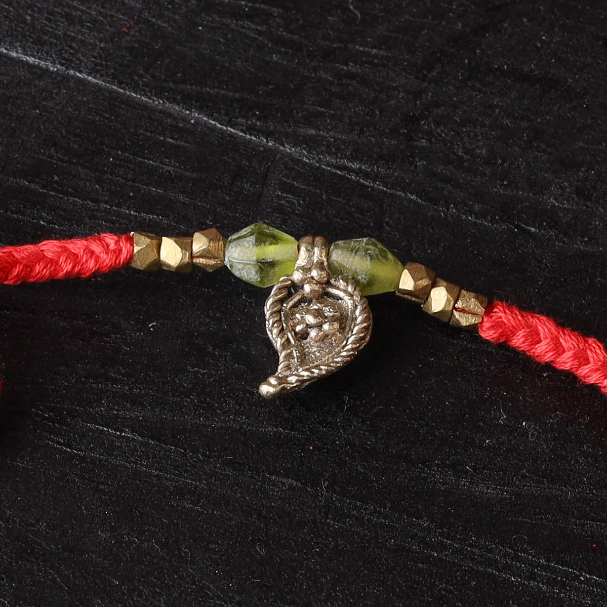 Red - Handcrafted Tribal Dokra Brass Thread Rakhi 23 - Image 2