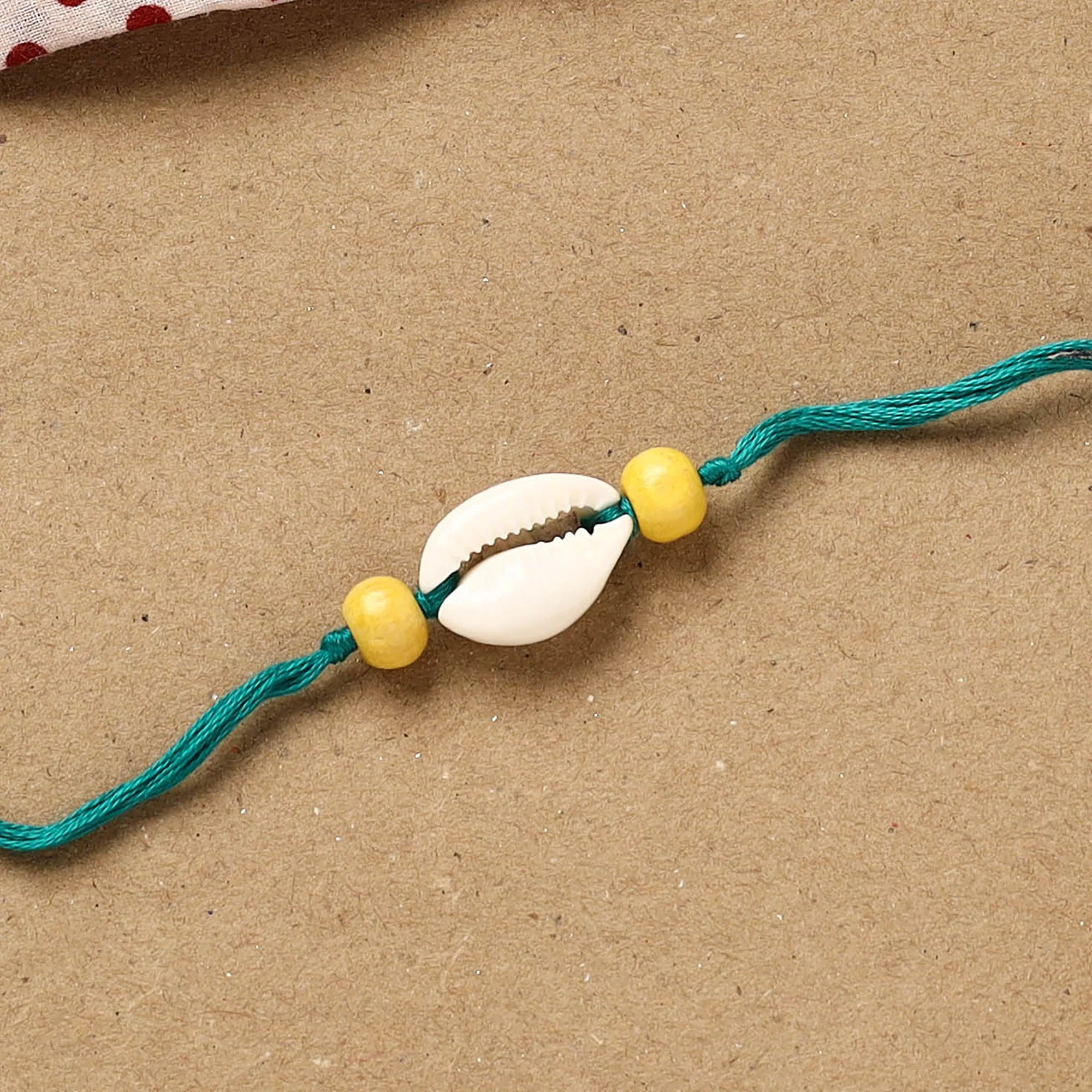 Handmade Shell Work Rakhi 150 - Image 2