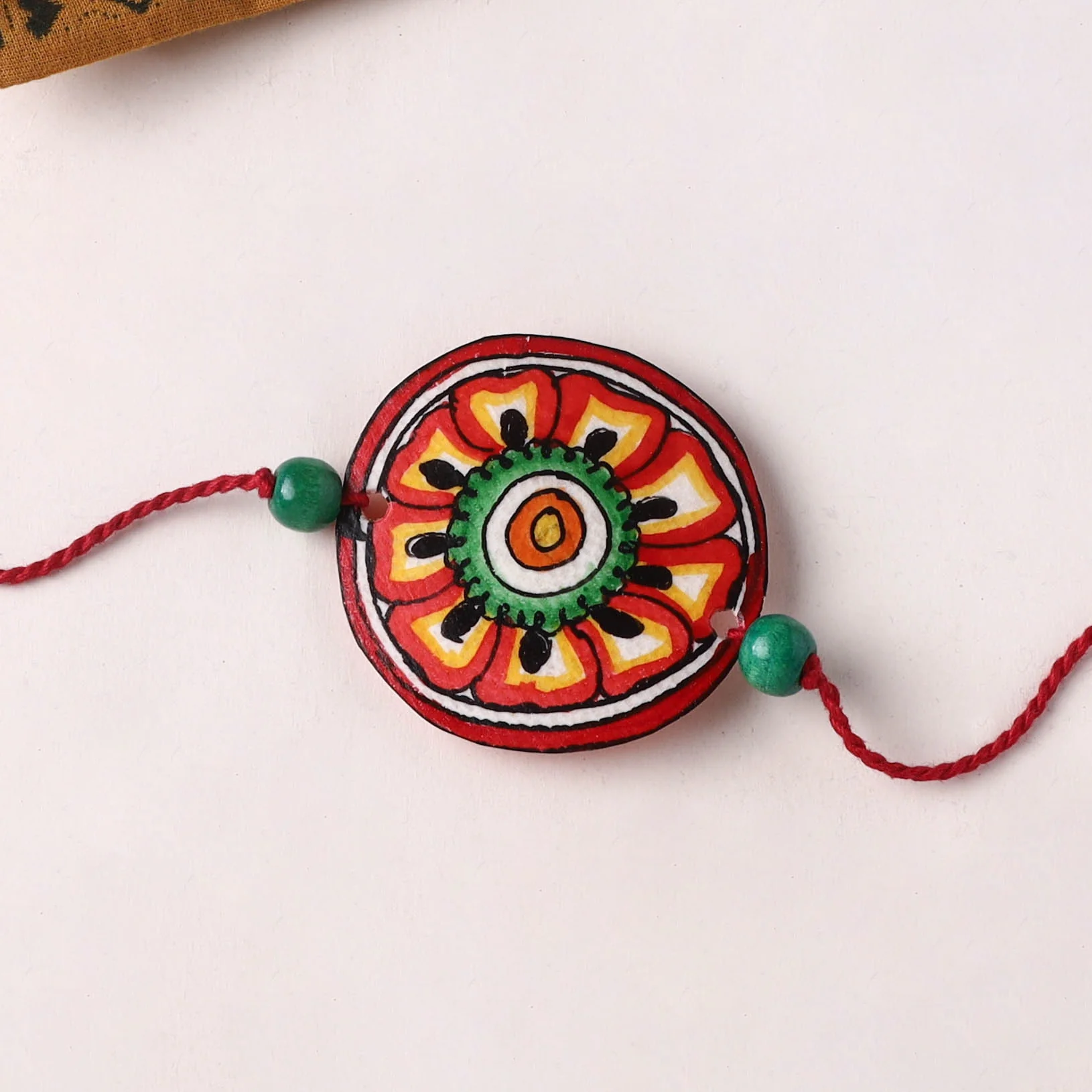 Flower - Handpainted Tholu Bommalata Leather Rakhi (Assorted) 01 - Image 2