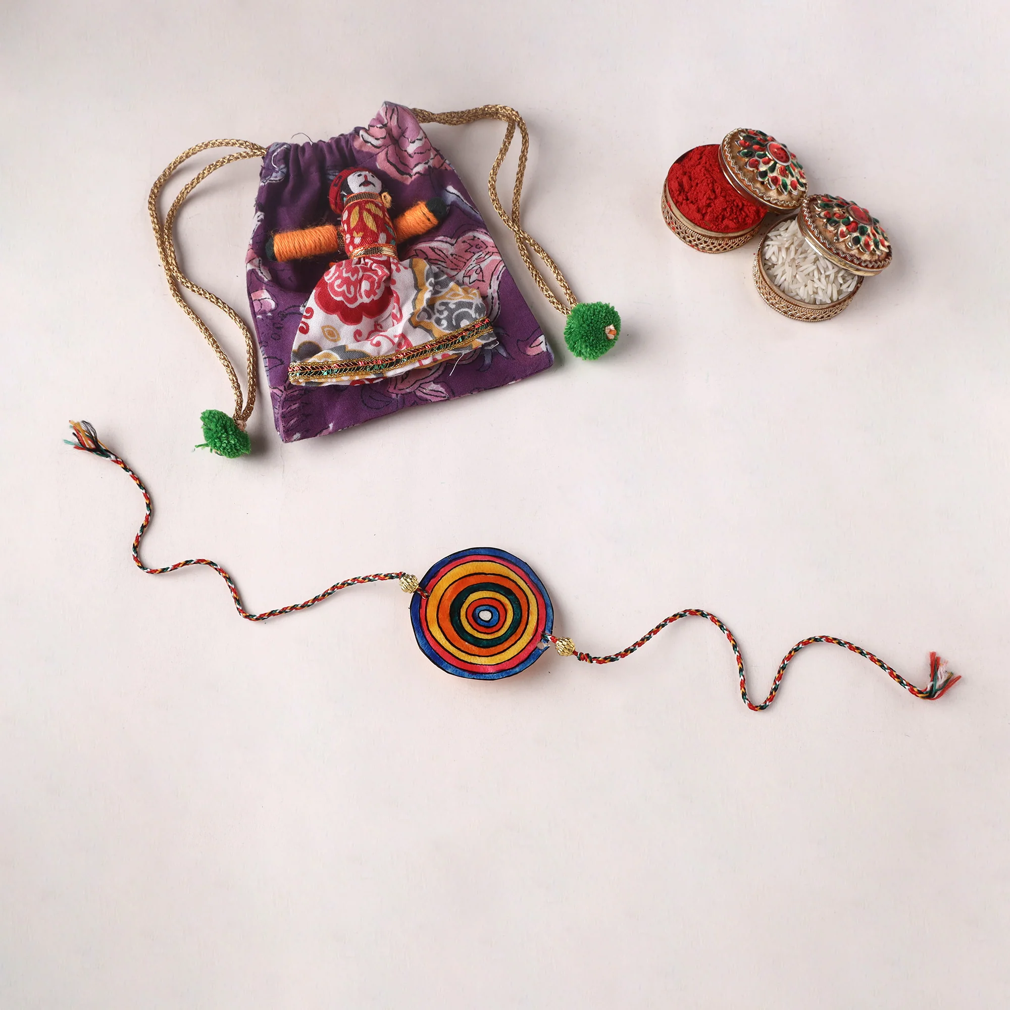 Handpainted Tholu Bommalata Leather Rakhi (Assorted) 17