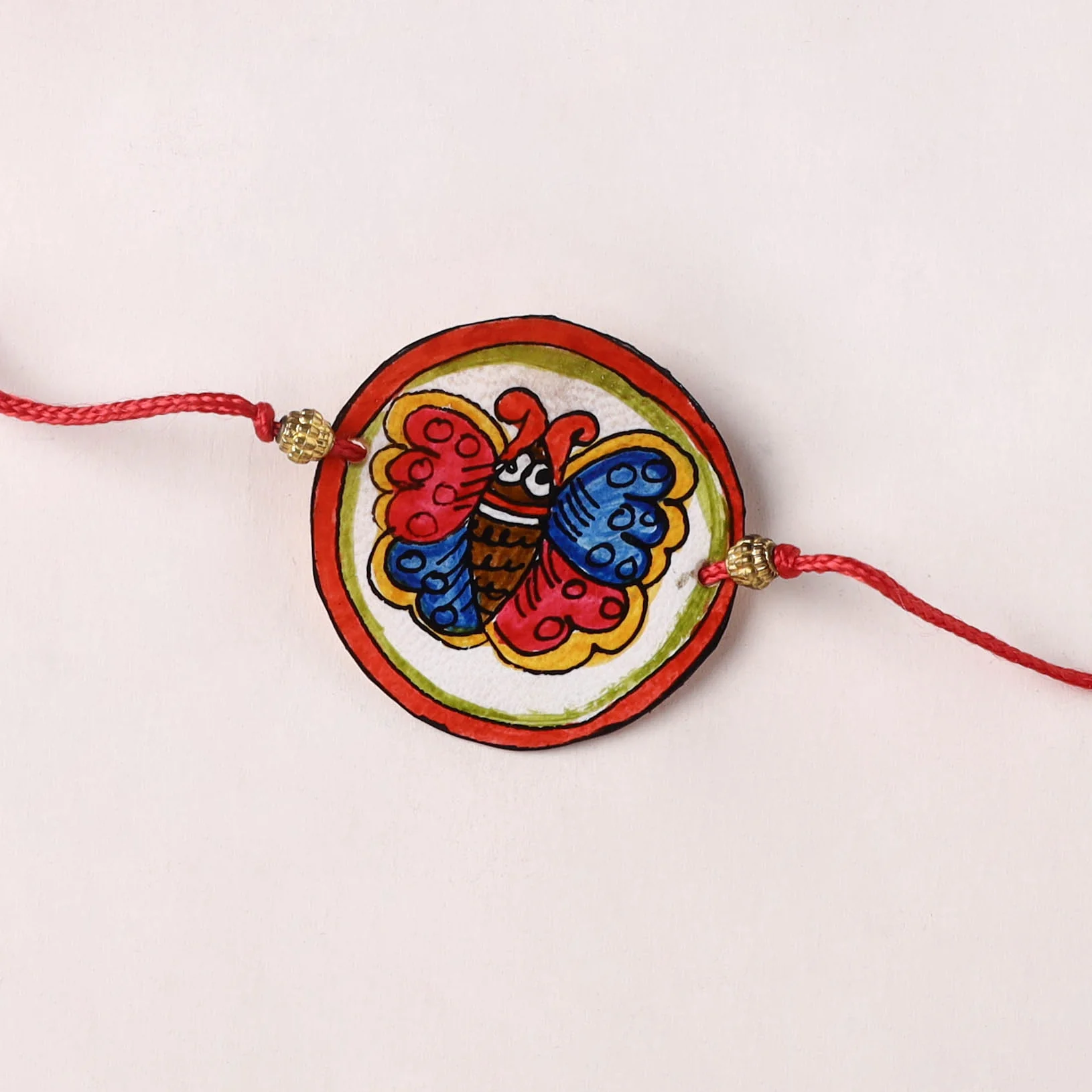 Butterfly - Handpainted Tholu Bommalata Leather Rakhi (Assorted) 20 - Image 2