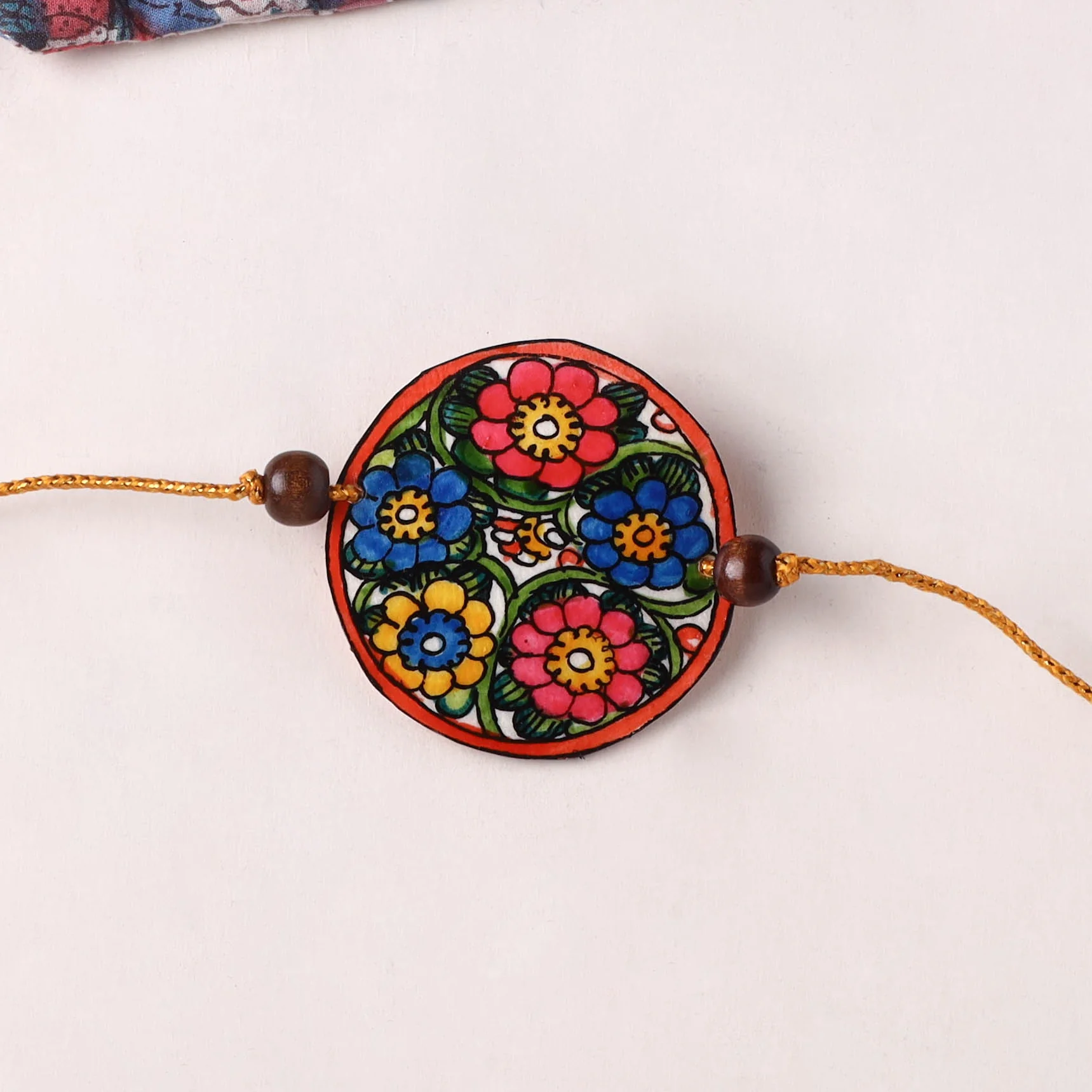 Flower - Handpainted Tholu Bommalata Leather Rakhi (Assorted) 33 - Image 2