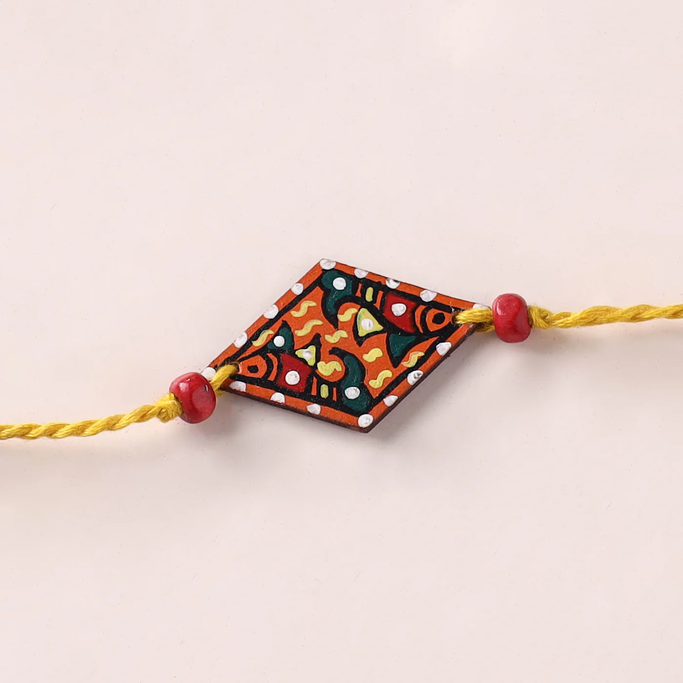 Madhubani Handpainted Wooden Rakhi 27 - Image 2