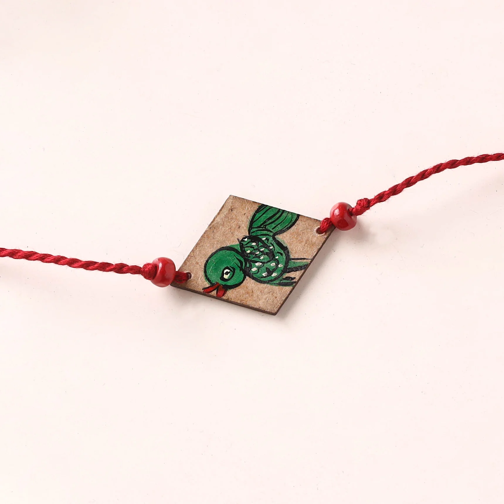 Pattachitra Handpainted Wooden Rakhi  81 - Image 3